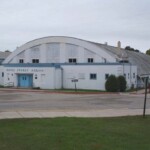 Theodore B. Wells of Grand Forks, ND designed the arena. Theodore B. Wells of Grand Forks, ND designed the arena.